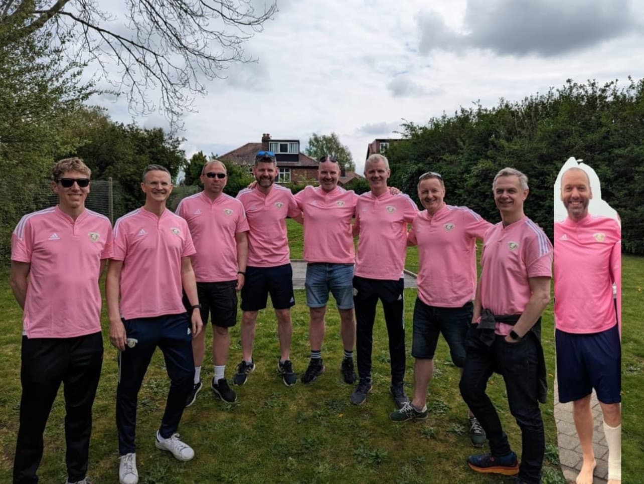 Spartinios coaches together in pink training tops